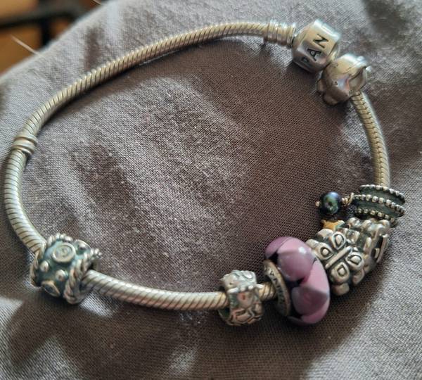 Authentic Stamped silver Pandora bracelet with 7 charms