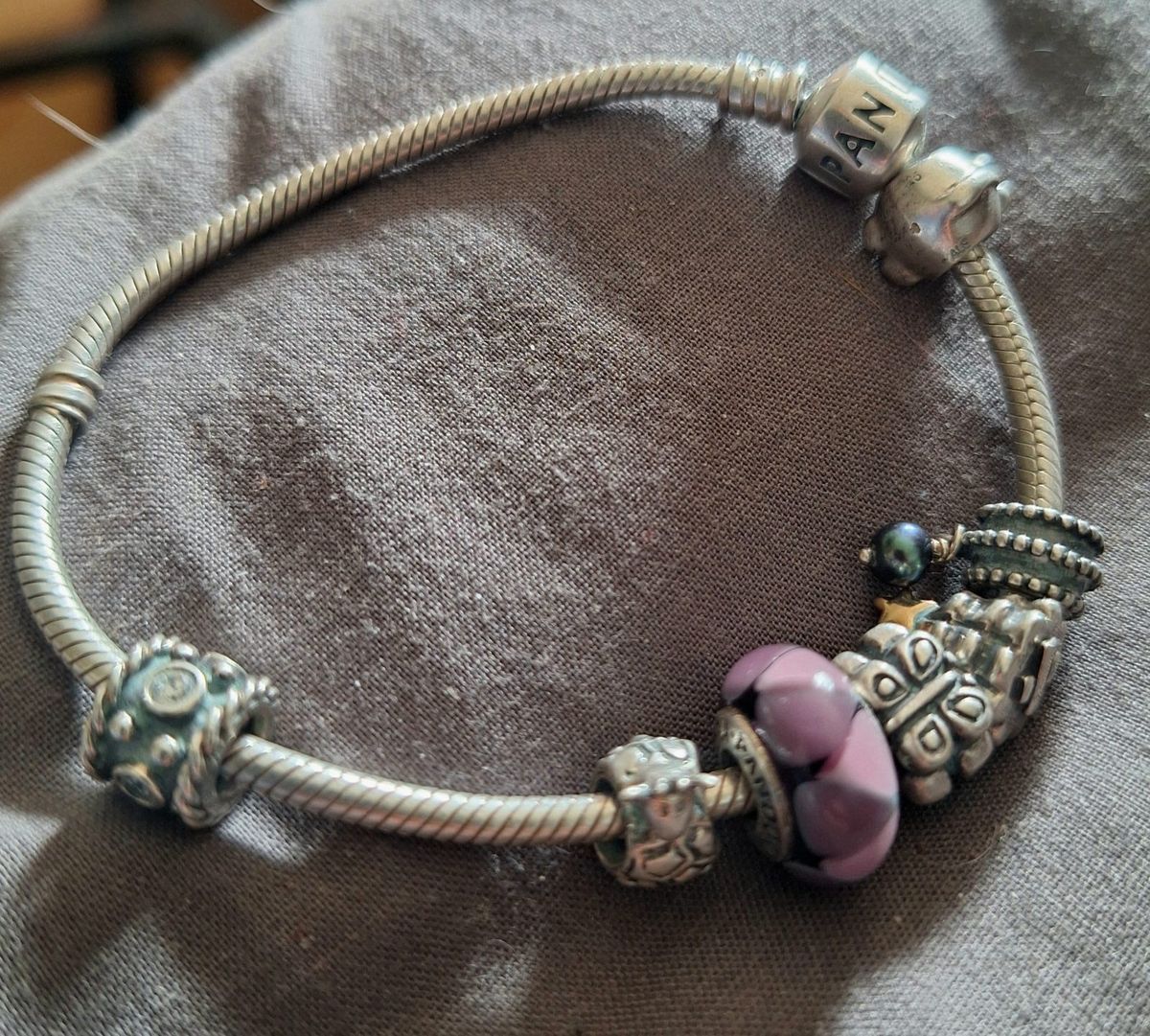 Authentic Stamped silver Pandora bracelet with 7 charms