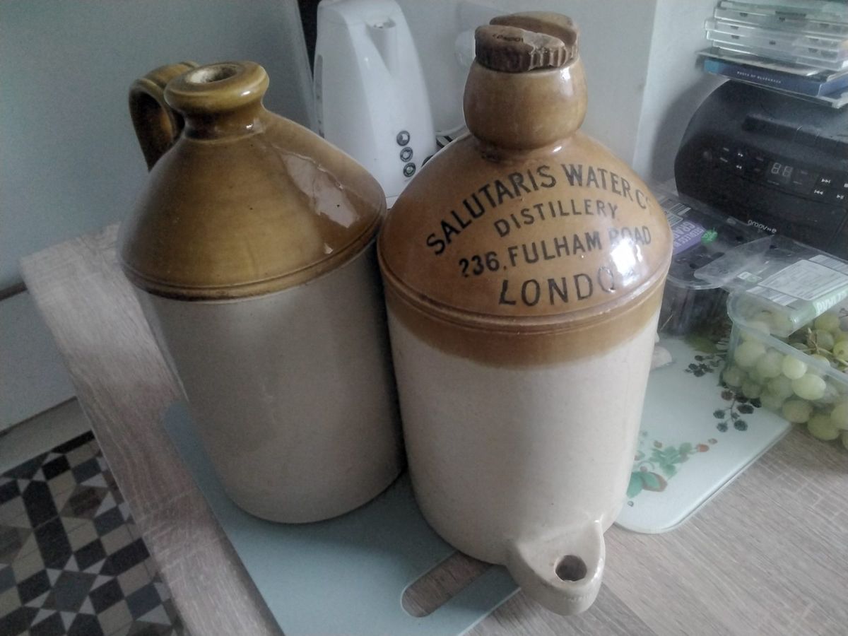 2 large earthenwear jugs